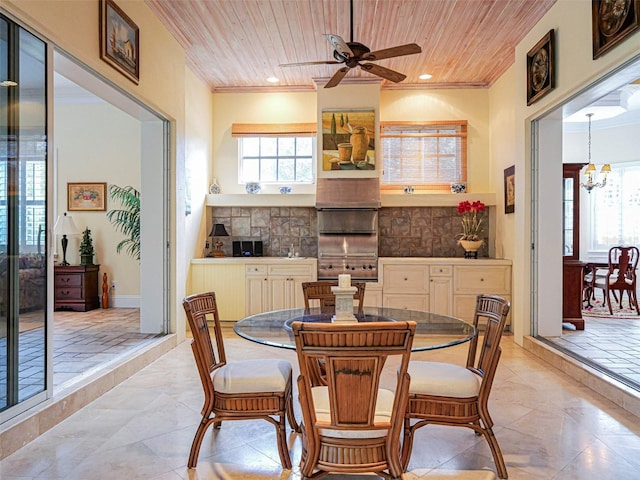 2266 12th St, Vero Beach, FL 32960 - dining area featuring ceiling fan with notable chandelier, wooden ceiling, recessed lighting, and ornamental molding