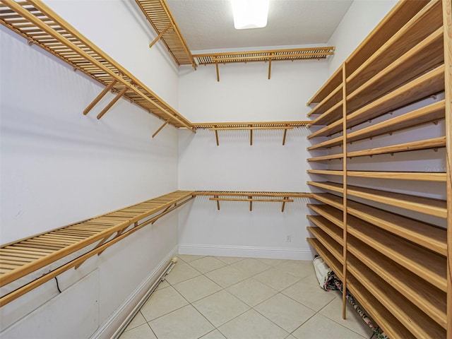 2266 12th St, Vero Beach, FL 32960 - spacious closet featuring light tile patterned floors