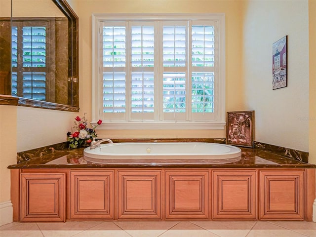 2266 12th St, Vero Beach, FL 32960 - bathroom featuring tile patterned floors and a garden tub
