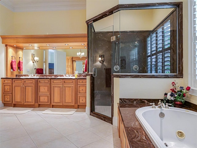 2266 12th St, Vero Beach, FL 32960 - full bathroom with a whirlpool tub, a shower stall, tile patterned floors, and a sink