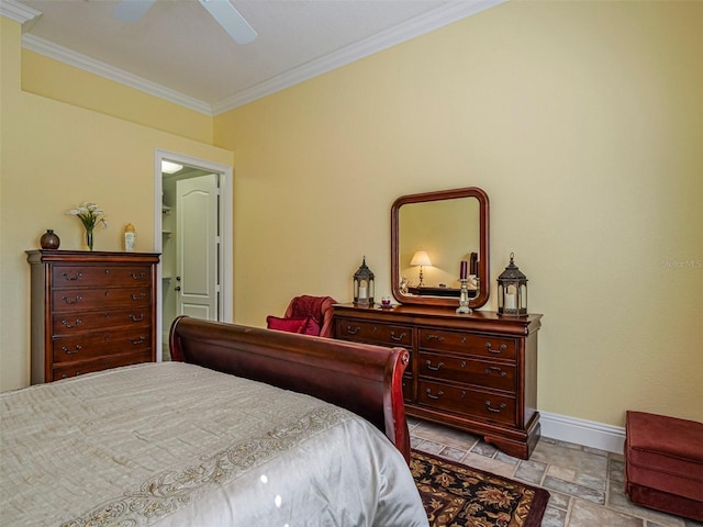 2266 12th St, Vero Beach, FL 32960 - bedroom featuring stone finish flooring, crown molding, baseboards, and a ceiling fan