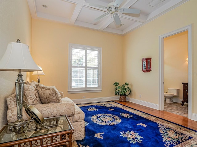 2266 12th St, Vero Beach, FL 32960 - living area featuring a ceiling fan, wood finished floors, coffered ceiling, beam ceiling, and visible vents