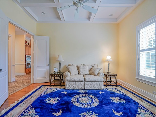2266 12th St, Vero Beach, FL 32960 - living area with plenty of natural light, a ceiling fan, wood finished floors, and coffered ceiling