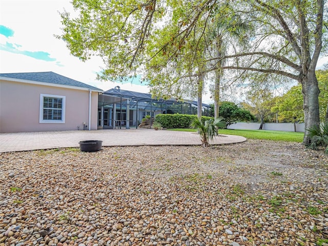 2266 12th St, Vero Beach, FL 32960 - back of property with a patio, a lanai, and stucco siding