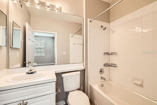 14238 Fredricksburg Dr Unit 310, Orlando, FL 32837 - full bathroom featuring visible vents, toilet,  shower combination, and vanity