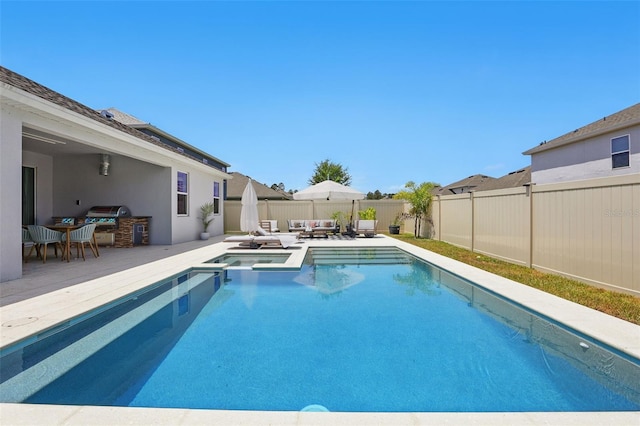 4779 Cragmere Loop, Clermont, FL 34711 - view of pool with a patio, an outdoor hangout area, area for grilling, a fenced backyard, and a pool with connected hot tub
