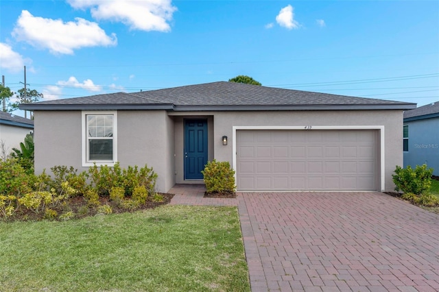 439 Sarah Nicole Way, New Smyrna Beach, FL 32168 - single story home featuring a garage, a front yard, stucco siding, and decorative driveway