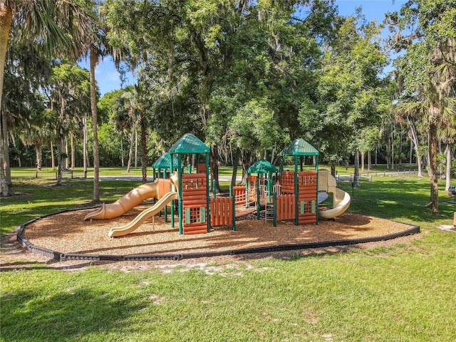2983 Park Meadow Dr, Apopka, FL 32703 - community jungle gym with a lawn and view of scattered trees