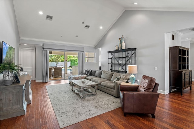 living area with visible vents, high vaulted ceiling, ornamental molding, and dark wood finished floors