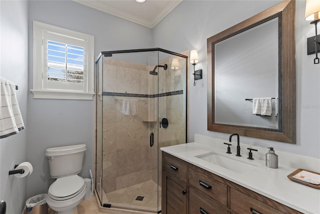 full bathroom with a shower stall, toilet, vanity, and ornamental molding