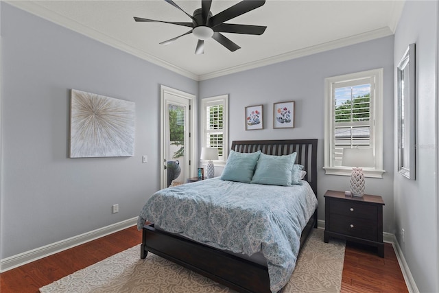 bedroom with baseboards, wood finished floors, access to outside, and crown molding