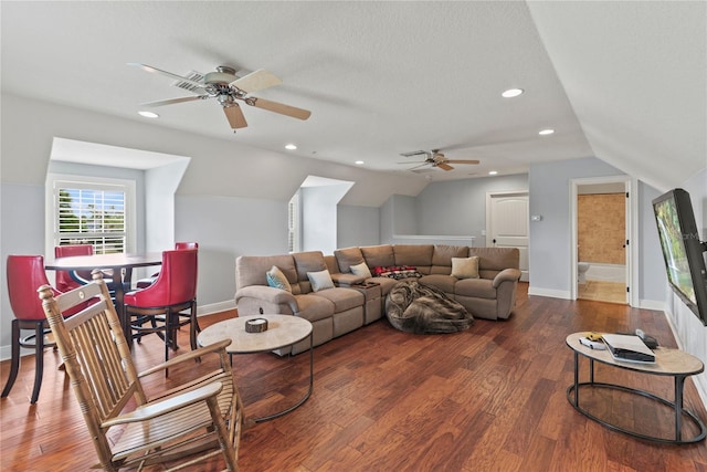 living area with baseboards, recessed lighting, lofted ceiling, wood finished floors, and ceiling fan