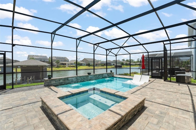 view of pool with central AC, a water view, a patio, and a lanai