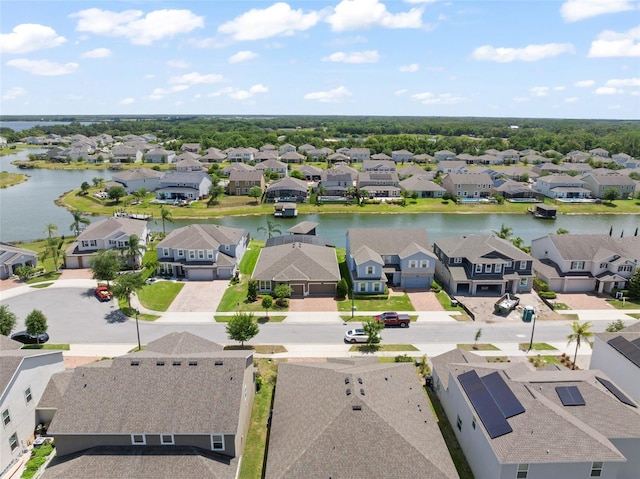 aerial view with a water view and a residential view