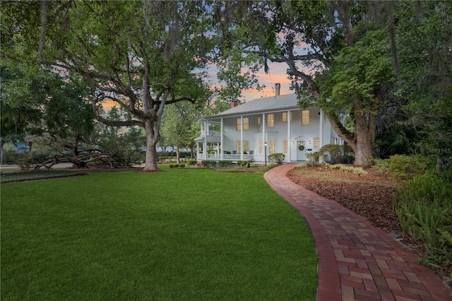 404 N Clara Ave, Deland, FL 32720 - view of grassy yard featuring a porch
