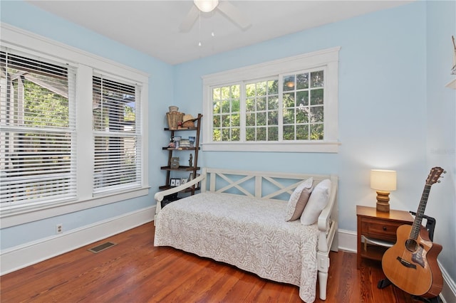 404 N Clara Ave, Deland, FL 32720 - bedroom featuring wood finished floors and a ceiling fan