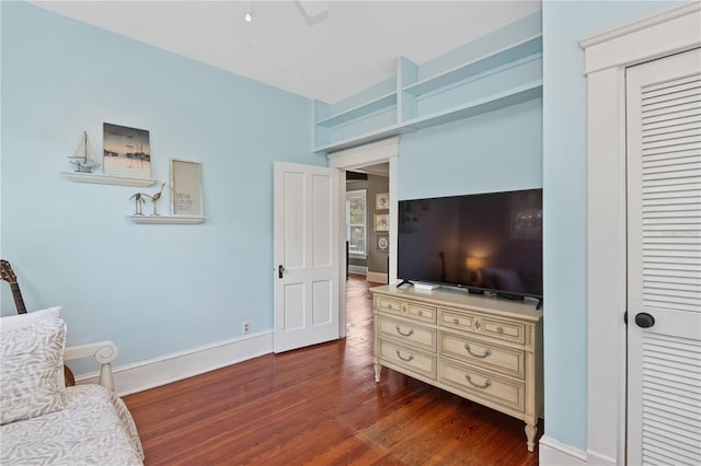 404 N Clara Ave, Deland, FL 32720 - bedroom with dark wood finished floors and a closet