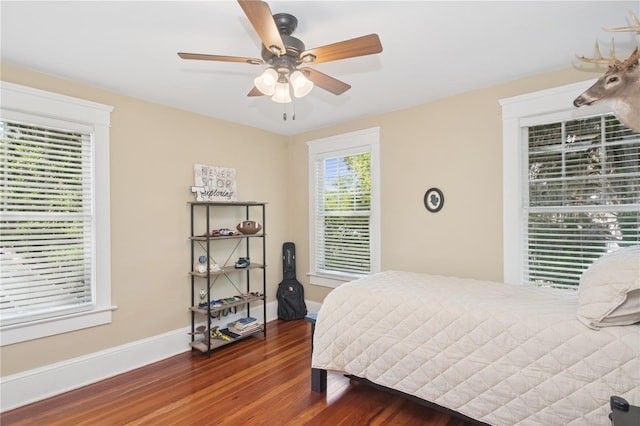 404 N Clara Ave, Deland, FL 32720 - bedroom featuring wood finished floors and a ceiling fan