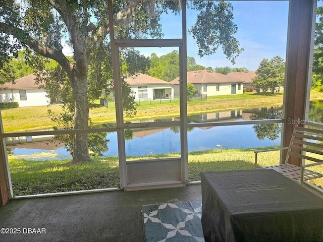 141 Campanello Ct, Daytona Beach, FL 32117 - sunroom / solarium with a water view and healthy amount of natural light