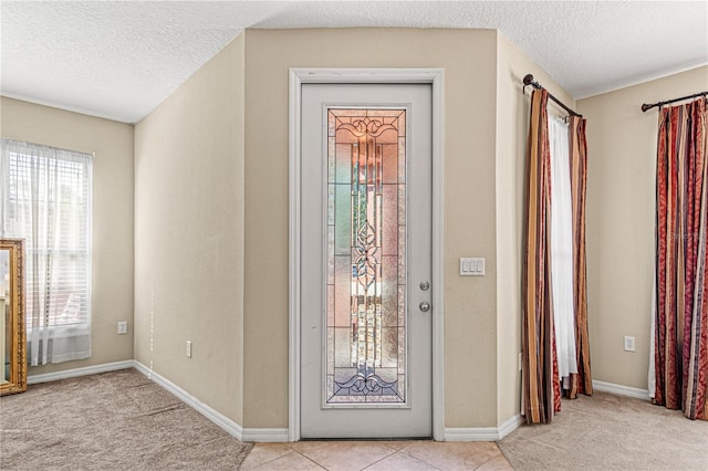 141 Campanello Ct, Daytona Beach, FL 32117 - carpeted entryway with a textured ceiling and baseboards