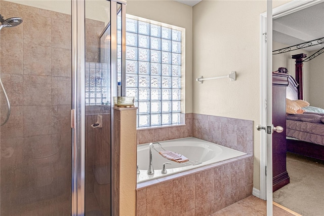 141 Campanello Ct, Daytona Beach, FL 32117 - ensuite bathroom with a shower stall and a bath