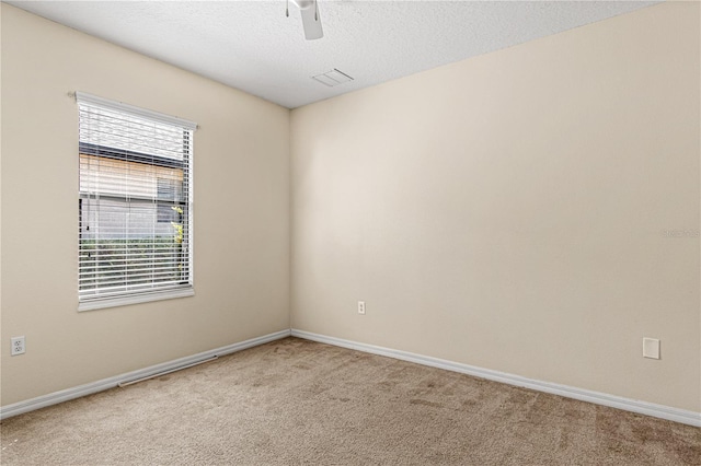 141 Campanello Ct, Daytona Beach, FL 32117 - empty room with light colored carpet, a ceiling fan, and baseboards