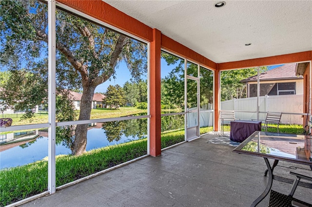141 Campanello Ct, Daytona Beach, FL 32117 - unfurnished sunroom featuring a water view