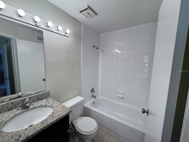 bathroom featuring toilet, a textured wall, shower / bath combination, and visible vents