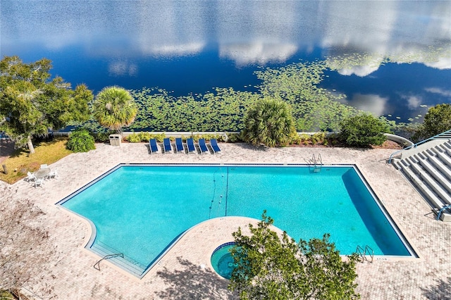 community pool with a patio