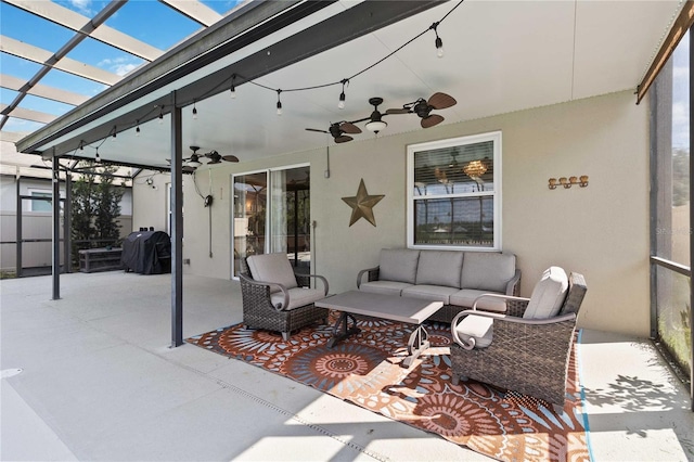 view of patio with an outdoor hangout area and a ceiling fan