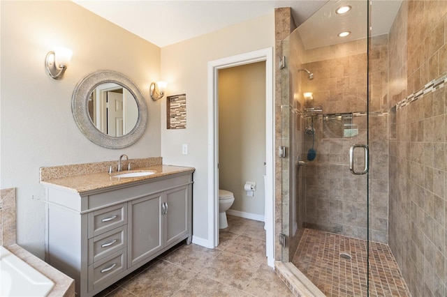 full bath with recessed lighting, tile patterned flooring, a shower stall, toilet, and vanity