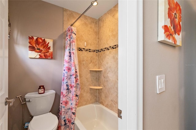 full bathroom with shower / bath combo and toilet