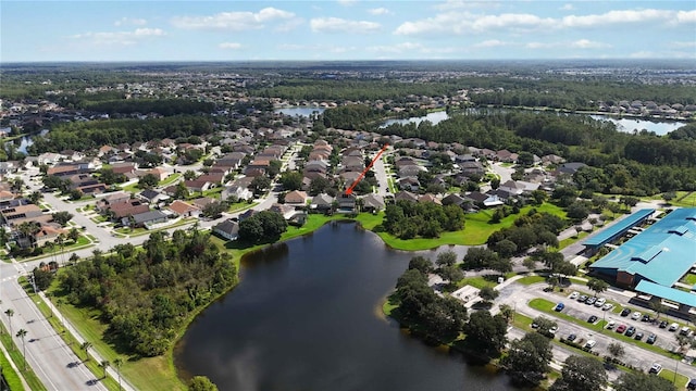 bird's eye view with a residential view and a water view