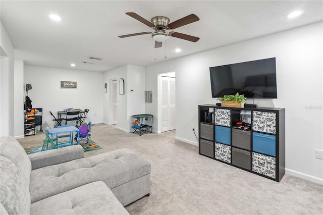 6102 Curry Ford Rd Unit 202, Orlando, FL 32822 - carpeted living room with visible vents, a ceiling fan, baseboards, and recessed lighting