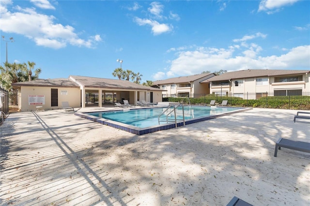 6102 Curry Ford Rd Unit 202, Orlando, FL 32822 - community pool featuring fence and a patio area