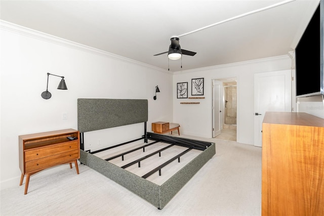 carpeted bedroom with baseboards, ornamental molding, and ensuite bathroom