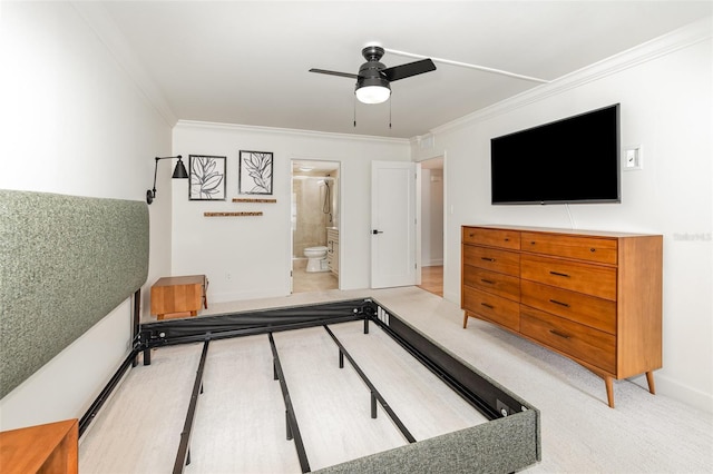 bedroom featuring a ceiling fan, baseboards, connected bathroom, and ornamental molding