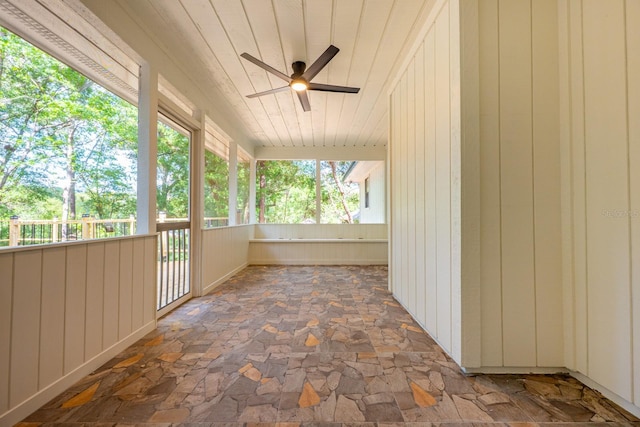 view of patio featuring ceiling fan