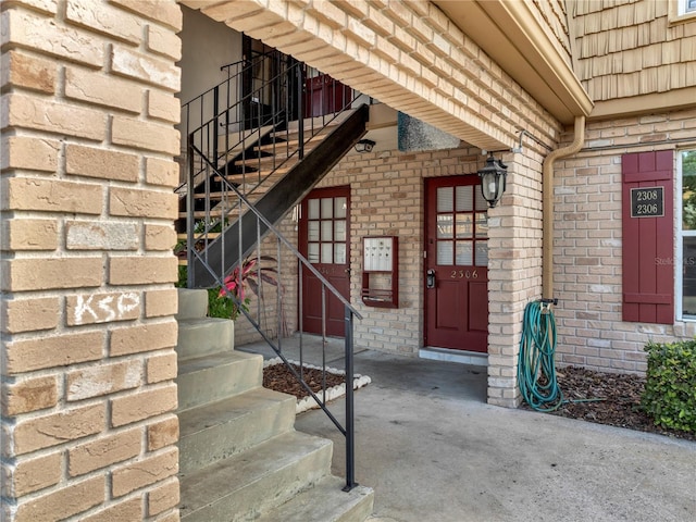 200 Saint Andrews Blvd Unit 2306, Winter Park, FL 32792 - view of exterior entry with brick siding