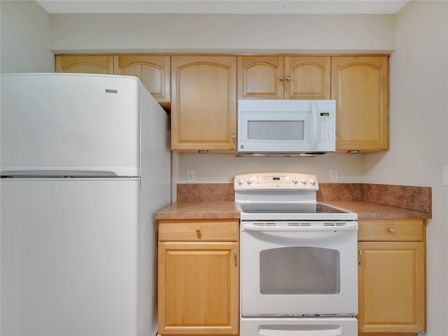 200 Saint Andrews Blvd Unit 2306, Winter Park, FL 32792 - kitchen featuring white appliances, light brown cabinets, and light countertops