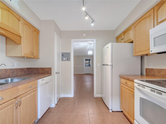 200 Saint Andrews Blvd Unit 2306, Winter Park, FL 32792 - kitchen with white appliances and light brown cabinets