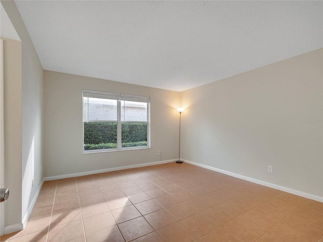 200 Saint Andrews Blvd Unit 2306, Winter Park, FL 32792 - spare room with light tile patterned flooring and baseboards