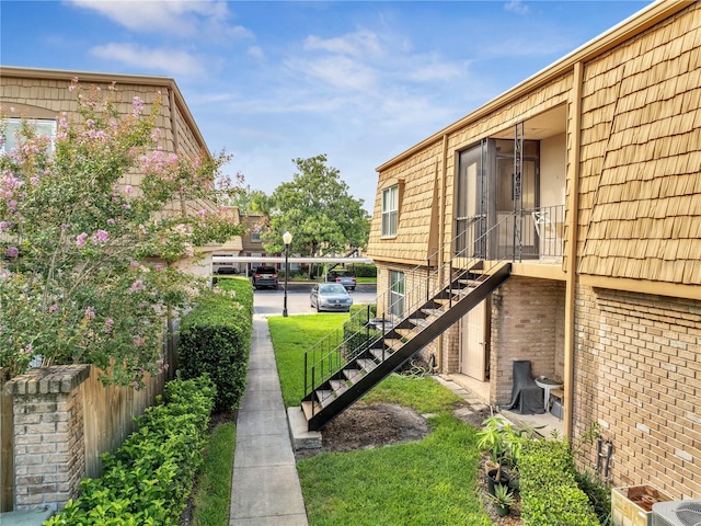 200 Saint Andrews Blvd Unit 2306, Winter Park, FL 32792 - view of grassy yard with stairway