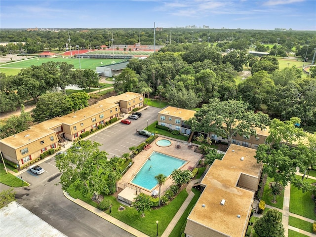 200 Saint Andrews Blvd Unit 2306, Winter Park, FL 32792 - bird's eye view of a pool and a tree filled landscape