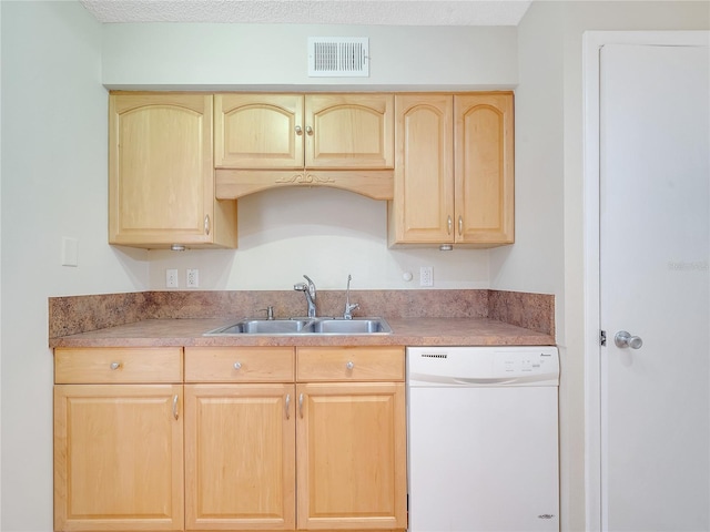 200 Saint Andrews Blvd Unit 2306, Winter Park, FL 32792 - kitchen featuring white dishwasher, light brown cabinets, and light countertops
