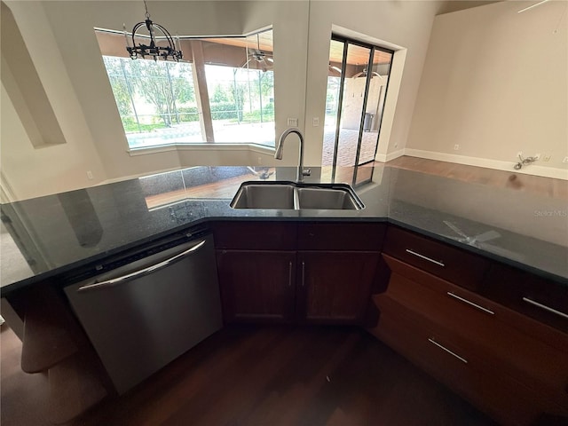 708 Palenci Ct, Winter Springs, FL 32708 - kitchen featuring a sink, dishwasher, dark wood-style flooring, and healthy amount of natural light