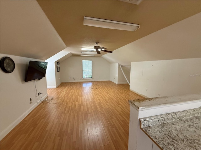 708 Palenci Ct, Winter Springs, FL 32708 - bonus room featuring light wood-type flooring, baseboards, vaulted ceiling, and ceiling fan
