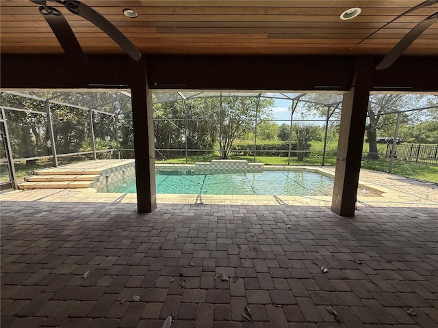 708 Palenci Ct, Winter Springs, FL 32708 - swimming pool with glass enclosure and a patio