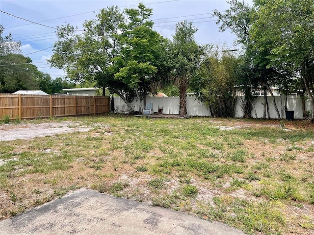 view of yard featuring a fenced backyard