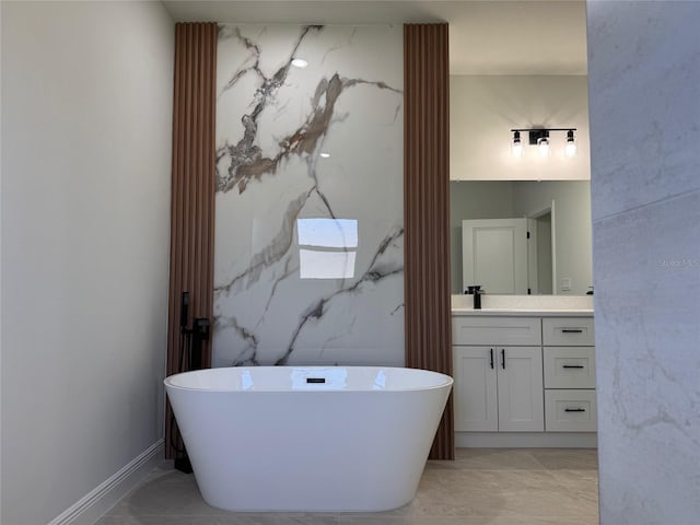 2406 SW 163rd Pl, Ocala, FL 34473 - full bath with marble finish floors, vanity, and a soaking tub